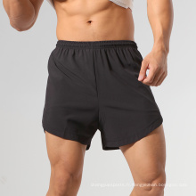 Shorts de course de temps de sport masculin